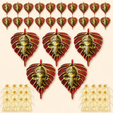 Metal leaf ganesha wall hanging decor featuring red and gold leaf-shaped ornaments with intricate detailing for home use
