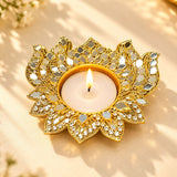 Metal lotus tea light candle holder in gold with mirrored and crystal embellishments for diwali pooja and home decor