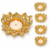 Metal lotus tea light candle holder in gold with mirrored and crystal embellishments for diwali pooja and home decor