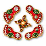Metallic lakshmi charan paduka red and green foot-shaped decorative pieces with gold trim rhinestones and central pearl for diwali decoration