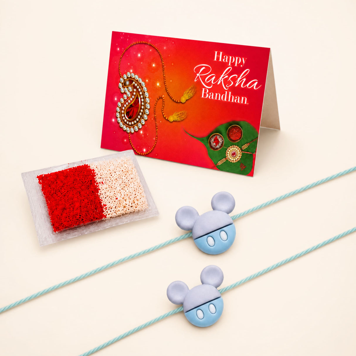Light blue and gray plastic mickey mouse rakhi charms with round eyes for traditional raksha bandhan gift set of 2
