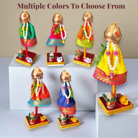 Colorful 7-inch mini Gudi Padwa figurines with copper helmets, embroidered dresses, plastic gathi mala