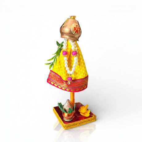 Mini golden Gudi Padwa headpiece with yellow-red fabric, beads, pearls, leaves on base