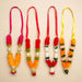 Set of 4 mini idol malas 4.5 inches with orange red fabric flowers green accents white pearls gold beads tassels for pooja