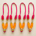 Set of 4 mini idol mala with vibrant pink and orange floral garlands featuring gold-toned metallic accents and pearl beads