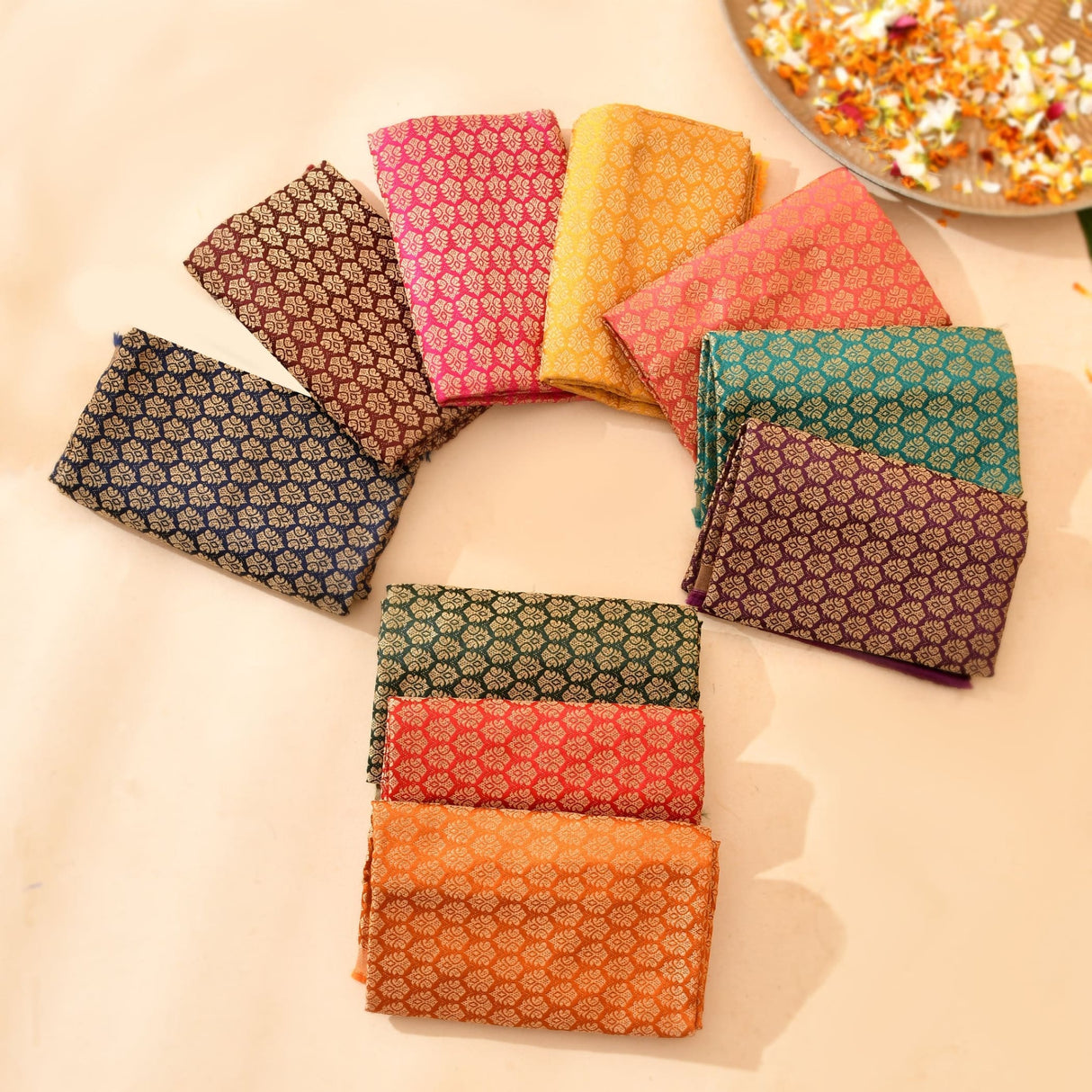 A collection of vibrant multicolor unstitched silk blouse pieces in pink gold teal and orange for saree and indian gifts