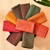 Unstitched multicolor blouse pieces in rich brocade fabric with intricate golden floral patterns for saree and indian gifts