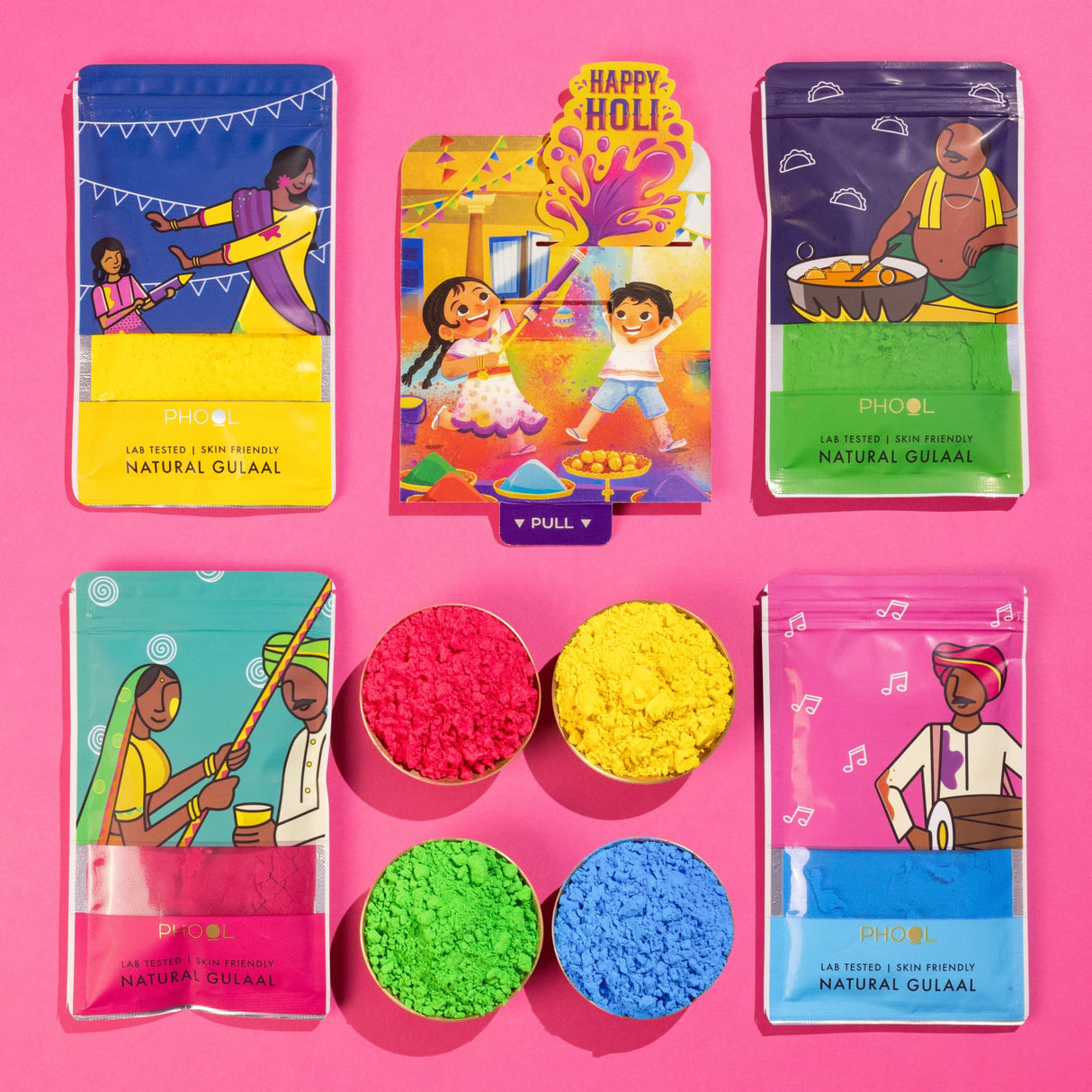 Colorful Phool natural Holi gulal packets in pink, blue, green, yellow