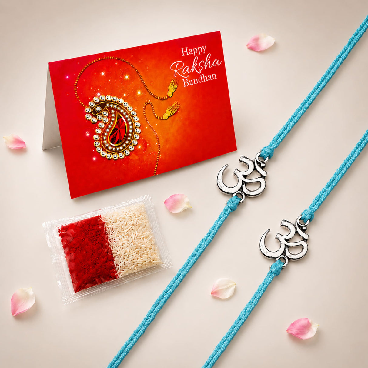 Two turquoise designer om rakhi bracelets with silver-toned om charms for brother and bhabhi traditional protection gift