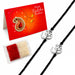 Silver om shaped charms on black cord designer om rakhi sets for brother and bhabhi with roli chawal and card