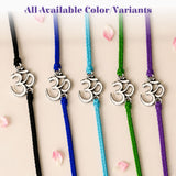Silver om symbol charms on colorful braided cords in designer om rakhi set for brother and bhabhi protection gift