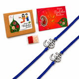 Two blue braided designer Om rakhi bracelets with silver-colored charms for brother and bhabhi Raksha Bandhan gift