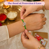 Green cord bracelet with silver om symbol charm designer om rakhi for brother and bhabhi traditional handmade