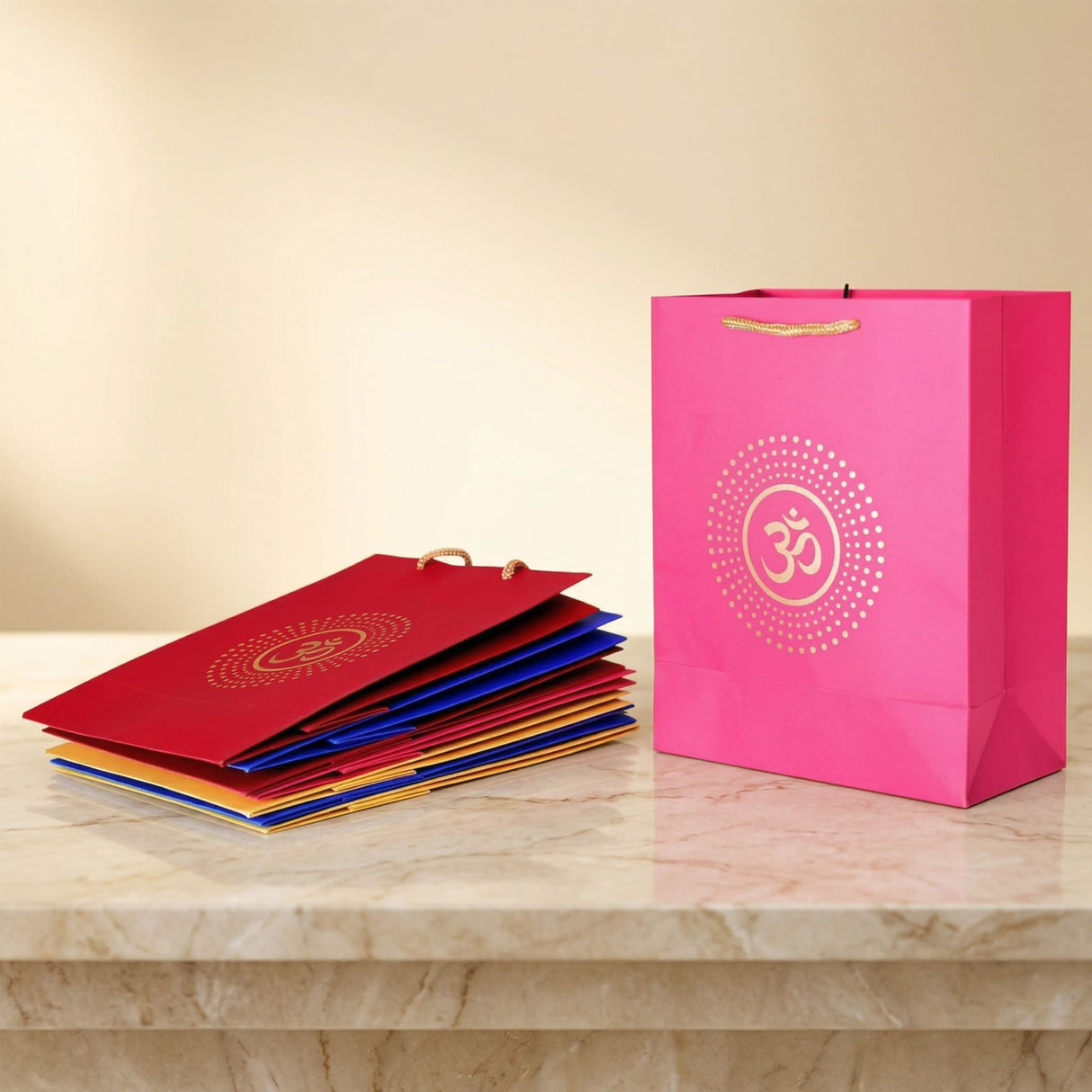Vibrant pink paper om carry bag with gold symbol and twisted handles eco friendly for wedding puja gift giving