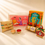 Religious Om Rakhi Hamper for Brother - Includes 2 Colorful Adjustable Bracelet Threads, Chocolate, Haldi Kumkum Holder, Thandai, Roli Chawal & Gift Box