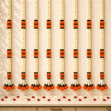 Elegant artificial jasmine marigold garland with white orange flowers and black accents for festive home décor