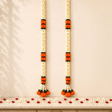 Artificial jasmine marigold garland with white jasmine, orange marigold, and black accents for festive decorations