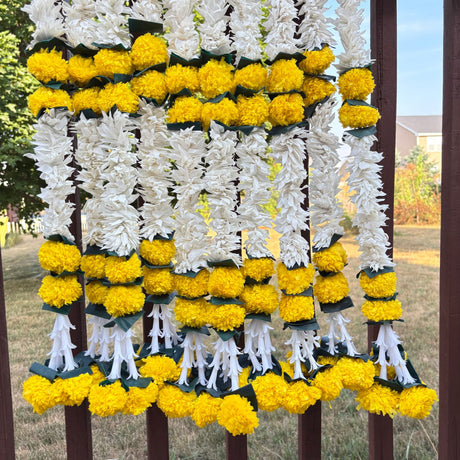 Yellow and white artificial marigold garlands for Diwali, Indian wedding, and Mexican Fiesta decor