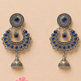 Indian oxidized silver floral chandbali earrings with deep blue stones and intricate filigree for ethnic wear