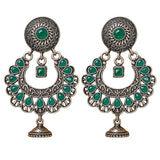 Indian oxidized floral chandbali earrings with intricate silver filigree and green stones featuring jhumka bells for ethnic wear