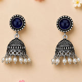 Silver oxidized floral jhumka earrings with deep blue stone and faux pearls for traditional diwali and wedding wear