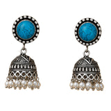 Silver oxidized floral jhumka earrings with turquoise stones clear crystals filigree and faux pearl dangles for ethnic wear