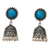 Silver oxidized floral jhumka earrings with turquoise stones clear crystals filigree and faux pearl dangles for ethnic wear