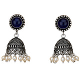 Silver oxidized floral jhumka earrings with dark blue stone and faux pearls for traditional boho ethnic wear