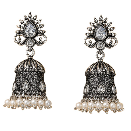 Silver oxidized floral jhumka earrings with intricate filigree work teardrop crystals and dangling faux pearls for ethnic wear