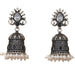 Silver and black ornate oxidized floral jhumka earrings with teardrop stone and faux pearls for diwali and ethnic wear