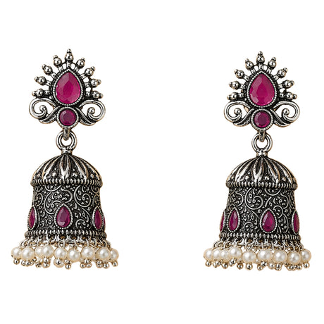 Silver oxidized floral jhumka earrings with intricate filigree, fuchsia gemstones, and white faux pearls for ethnic wear