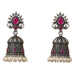 Silver oxidized floral jhumka earrings with intricate filigree, fuchsia gemstones, and white faux pearls for ethnic wear