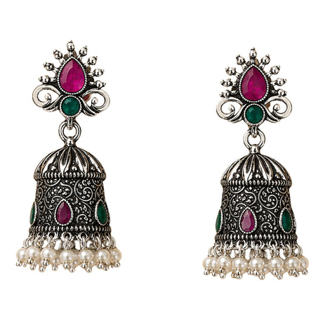 Indian oxidized silver jhumka earrings with intricate filigree pink and green gemstones and white faux pearl dangles