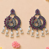 Boho peacock oxidized silver chandbali earrings with red and purple stones and white pearl dangles for ethnic wear