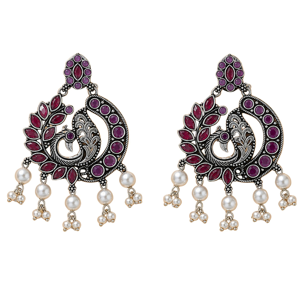 Silver peacock chandbali earrings with red and purple gemstones and pearl dangles for traditional Indian wear