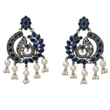 Silver tone boho peacock chandbali earrings with deep blue gemstones and white pearl dangles for ethnic wear