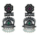 Silver oxidized elephant-themed floral jhumka earrings with ruby and emerald stones and dangling faux pearl beads for ethnic wear