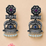 Indian oxidized silver jhumka earrings with intricate floral elephant design purple blue gemstones and faux pearl dangles for ethnic wear