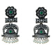 Silver oxidized floral jhumka earrings with green gemstone accents and pearl drops for diwali and ethnic wear
