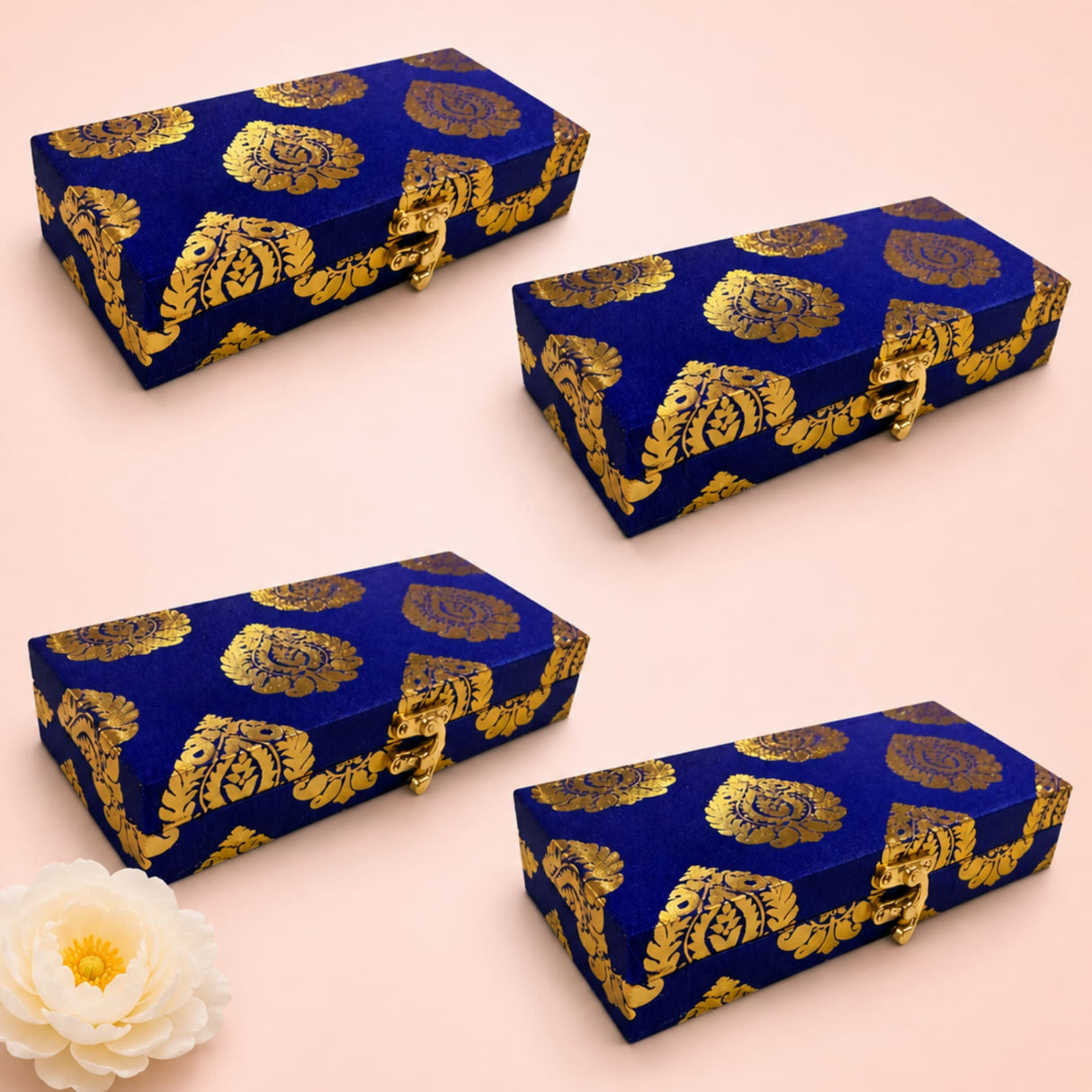 Deep blue brocade jewelry organizer boxes with gold paisley patterns and metallic clasps for traditional wedding favors