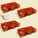 Red rectangular brocade jewelry organizer boxes with gold paisley patterns and metallic clasps for wedding favors