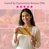 Yellow clutch with red gold Bandhani patterns and silver chain strap