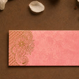 Pink textured wedding money envelope with intricate gold paisley floral embossing for indian wedding gift holder