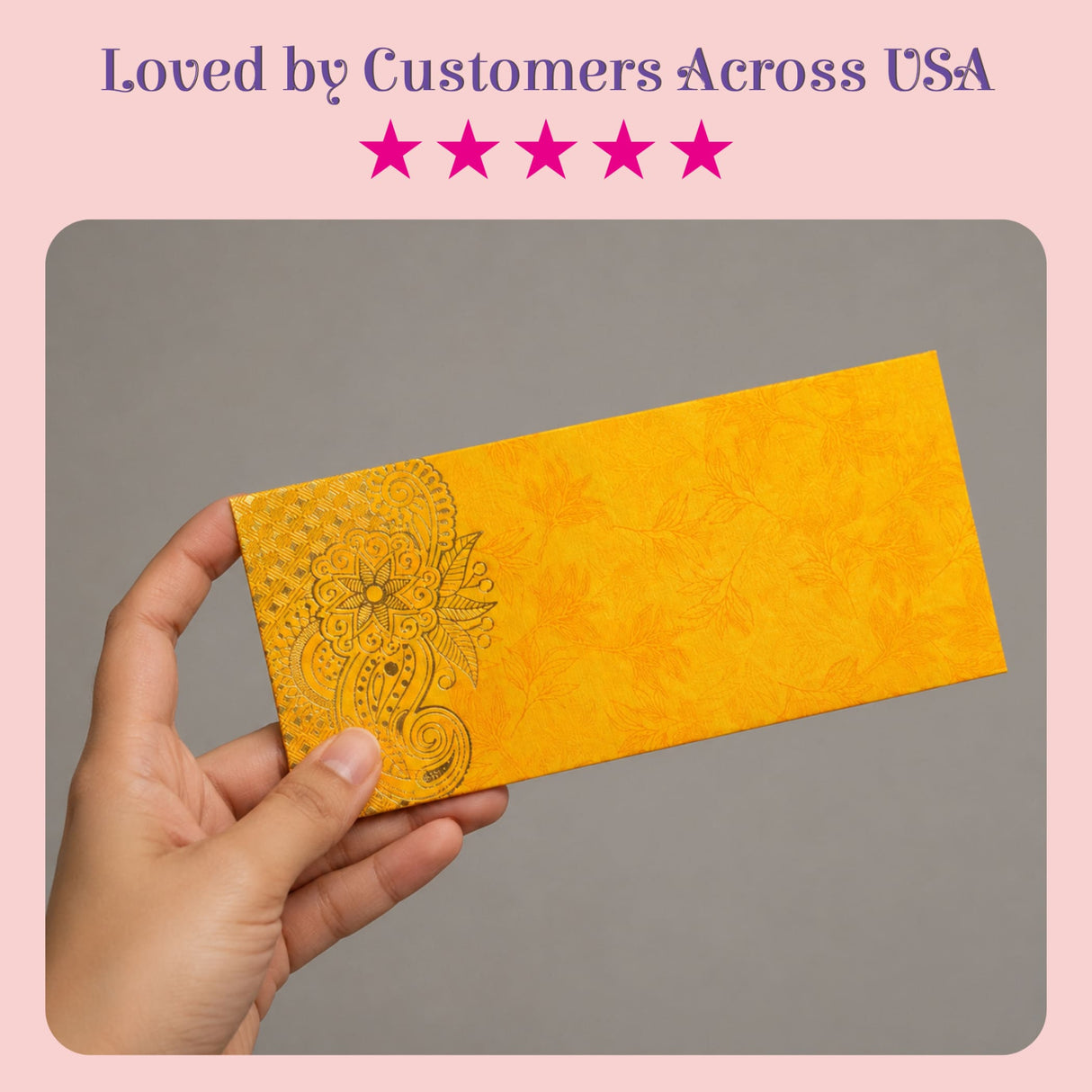 A vibrant yellow money envelope with black floral embossing on textured paper for indian wedding cash gifts