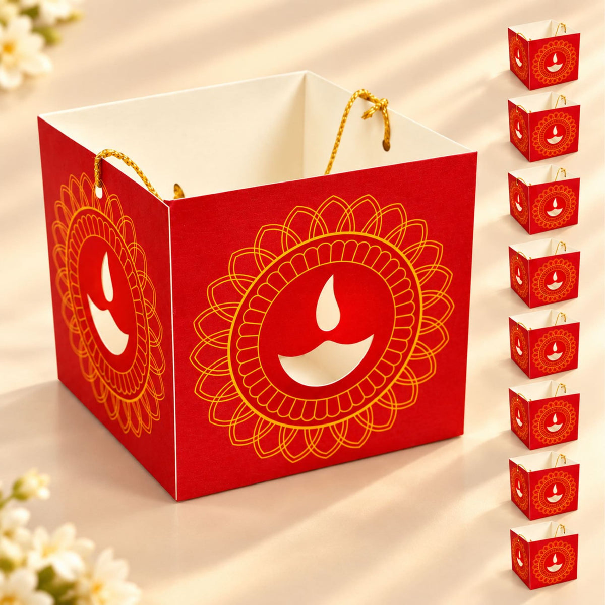 Red paper diwali lantern box with gold foil diya design and twisted rope handles for festive indian decor