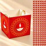 Red paper diwali lantern box with gold and white traditional oil lamp design for festive indian party decor