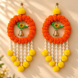 Vibrant orange marigold artificial hanging jhoomer garland with green yellow bird pendant gold bell and white tassels for festive decor