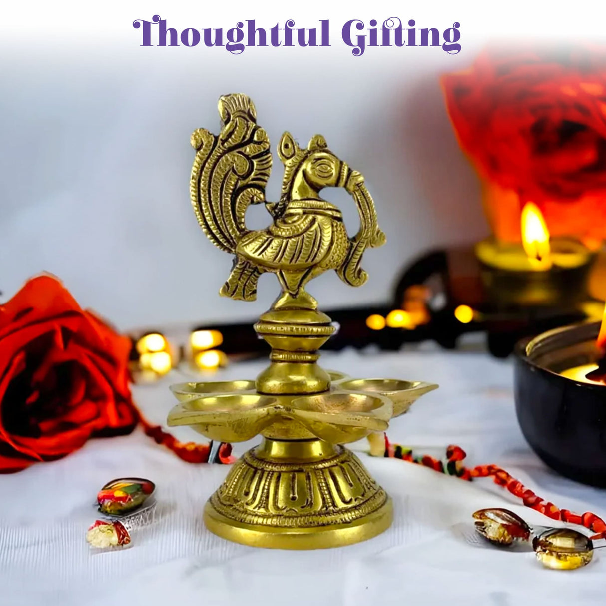 Golden brass diya with intricate peacock design and four oil holders for diwali puja home decor and festive use
