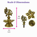 Brass finish peacock deepam diya oil lamp with intricate detailing on tiered base for Indian festival puja decor