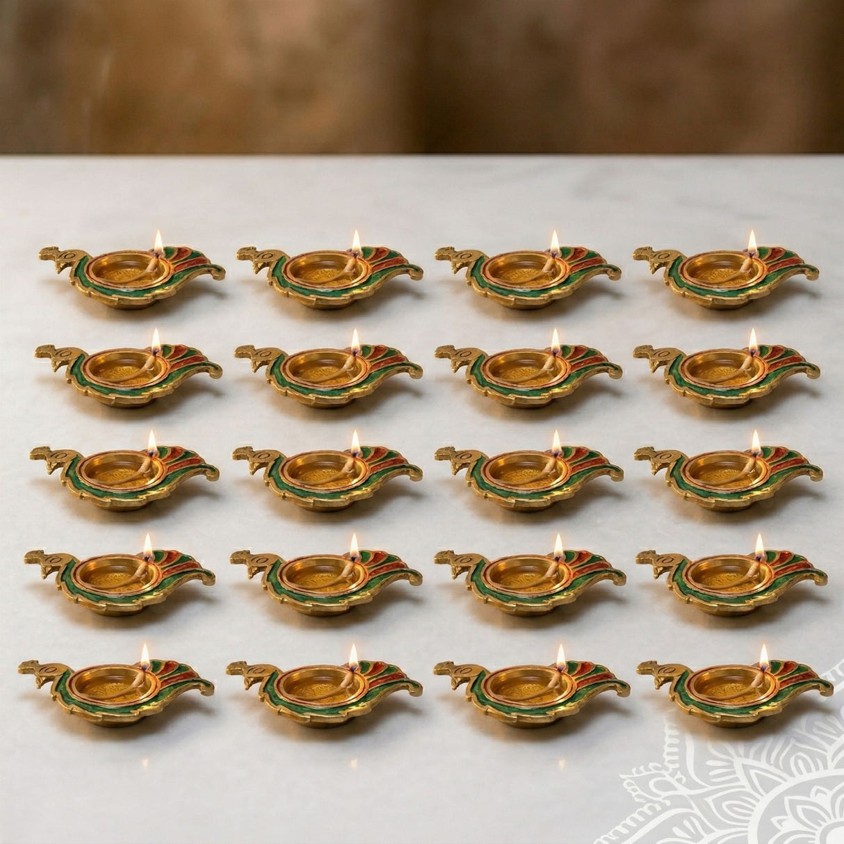 Golden brass diya lamps with green and red accents lit with small flames for diwali puja home decor and gifts